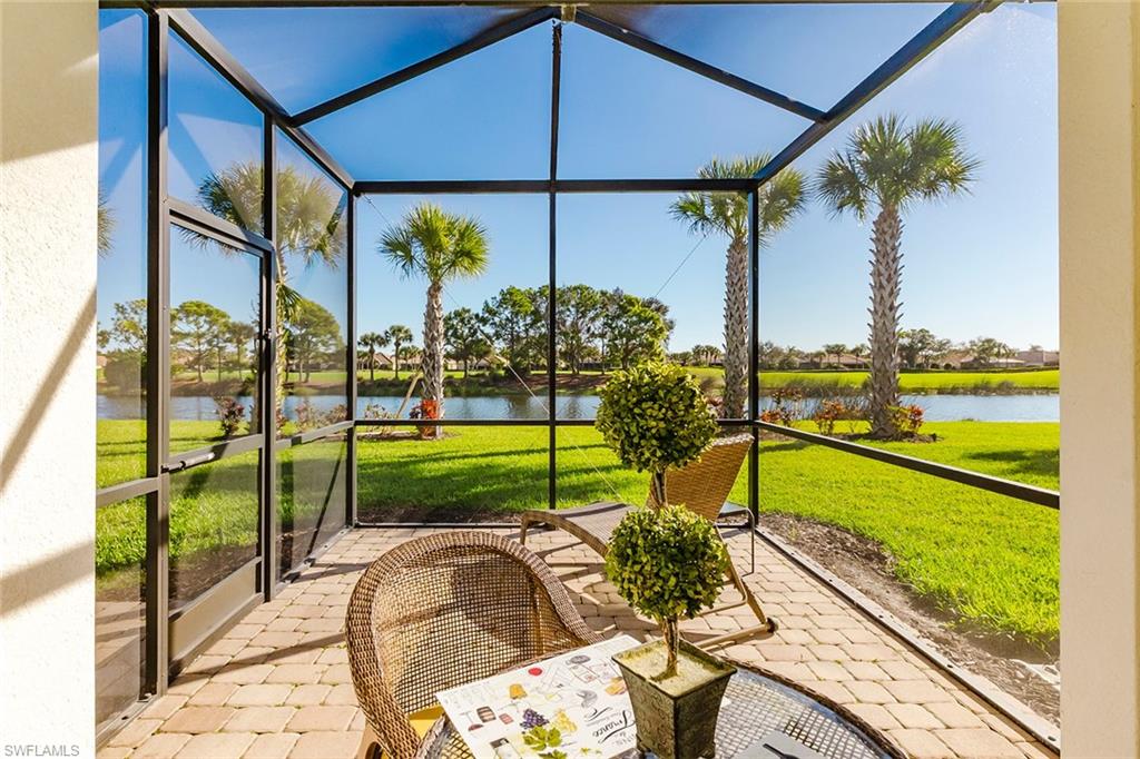 Beautiful golf course and pond views surrounding screened patio.