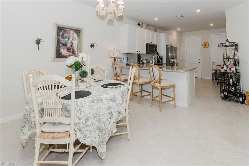 5948 Mayflower Way Ave Maria, FL 34142 - Photo 12 of 49 Foyer and den to the right. Looking into kitchen