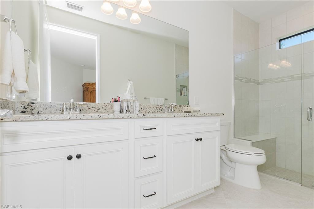 5948 Mayflower Way Ave Maria, FL 34142 - Photo 25 of 49 Dual sinks. Comfort height toilet.