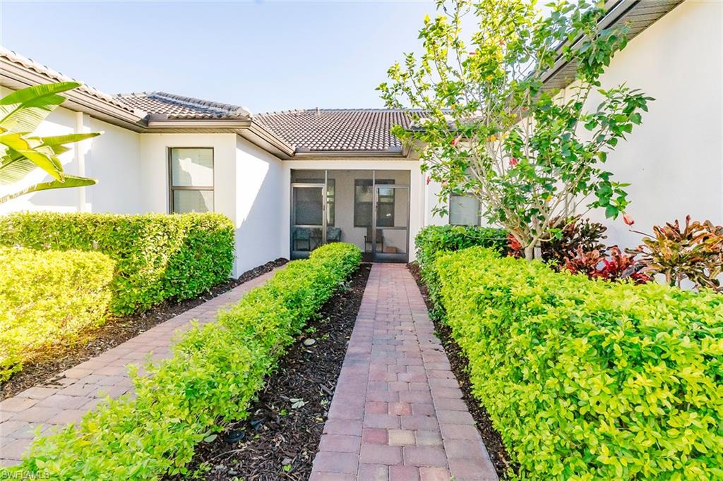 5948 Mayflower Way Ave Maria, FL 34142 - Photo 6 of 49 Screened in front porch.