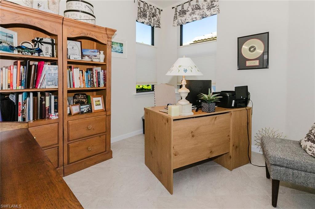 5948 Mayflower Way Ave Maria, FL 34142 - Photo 9 of 49 As you walk in foyer, office with glass french doors to the right.