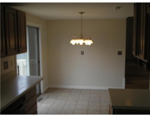 66 Gristmill Road Warwick, RI 02889 - Photo 6 of 10 Living Room. KITCHEN / DINING AREA