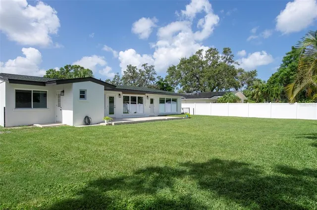 a view of outdoor space yard and swimming pool
