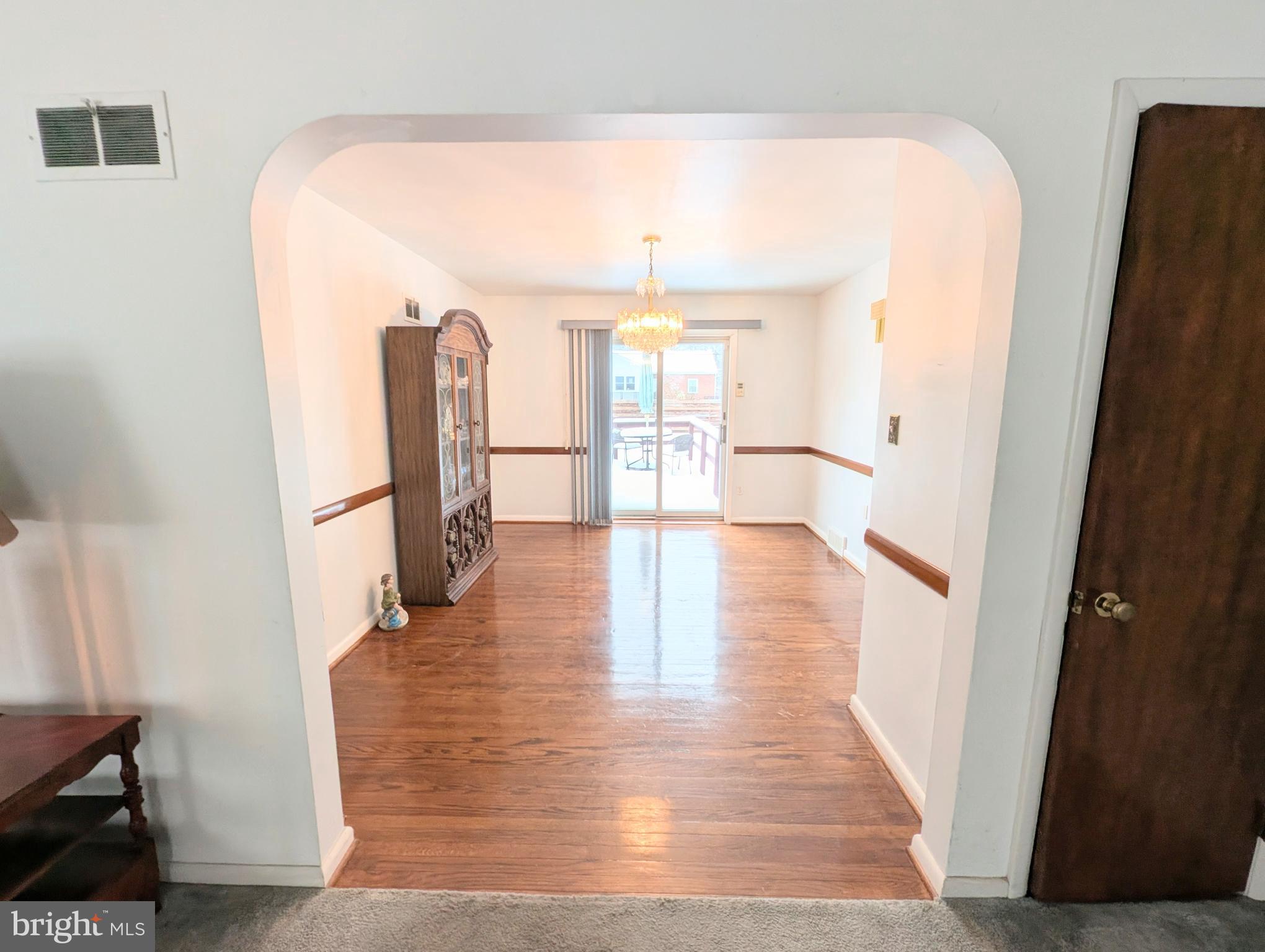 85 Savo Avenue Lancaster, PA 17601 - Photo 11 of 19 a view of a hallway with wooden floor and livingroom view