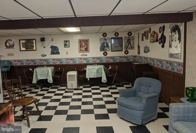 a black and white kitchen with a black white checkered oven