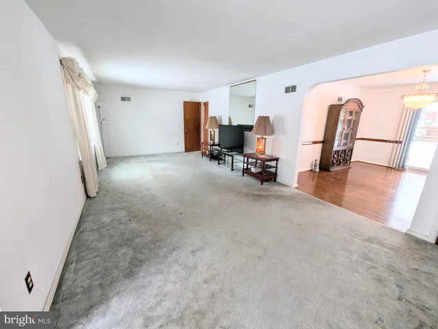 a view of livingroom with furniture and a window
