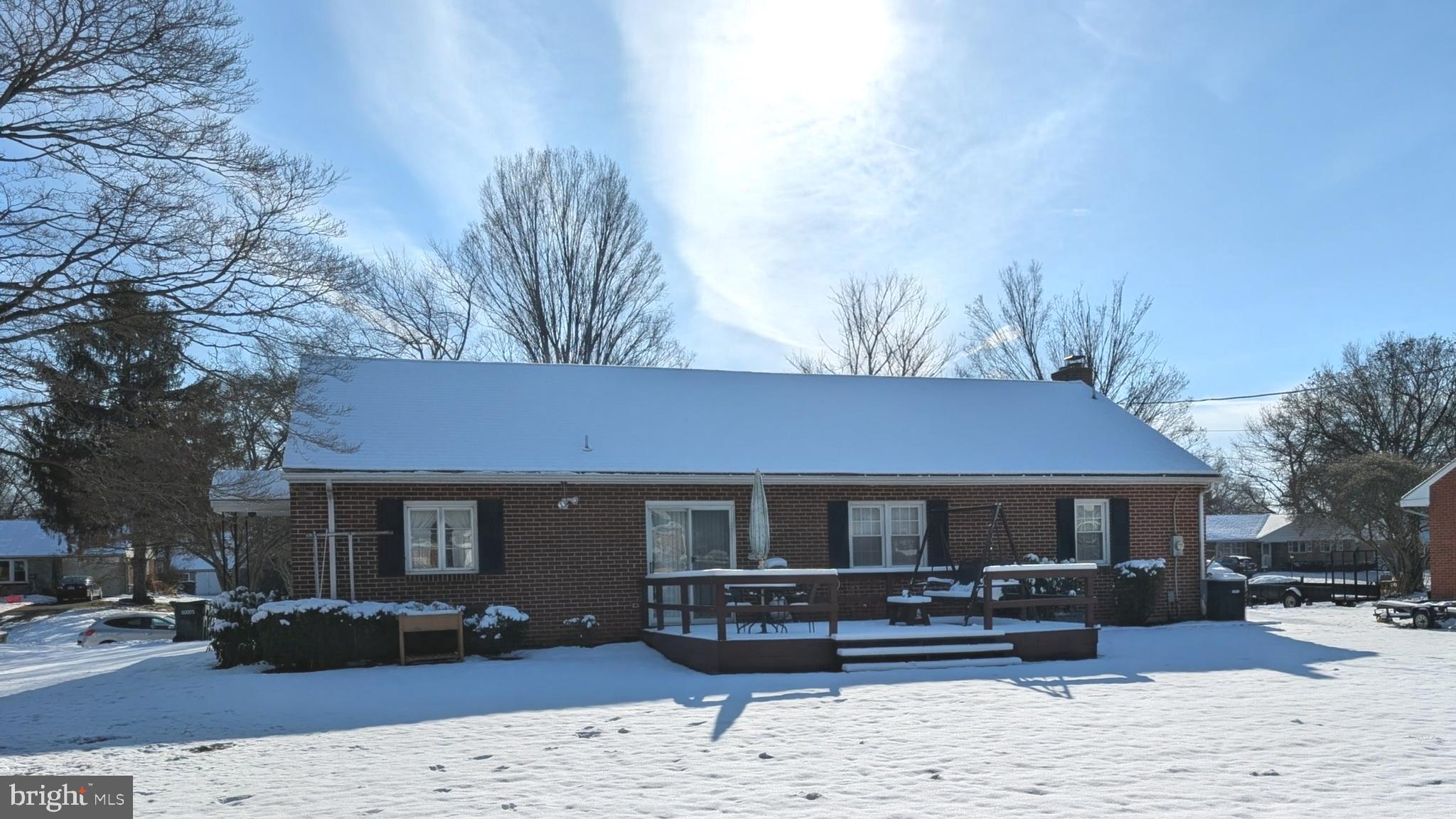 85 Savo Avenue Lancaster, PA 17601 - Photo 4 of 19 a front view of a house with a yard covered in snow
