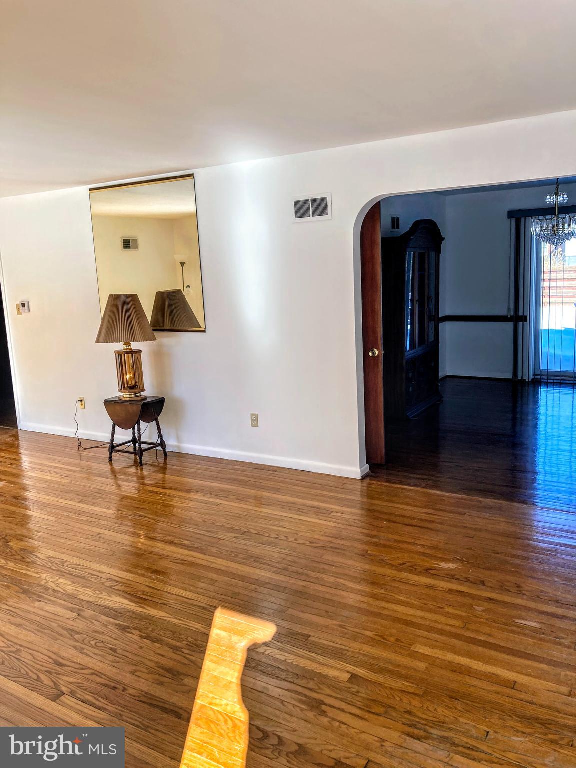 85 Savo Avenue Lancaster, PA 17601 - Photo 5 of 19 a view of a room with wooden floor table and staircase
