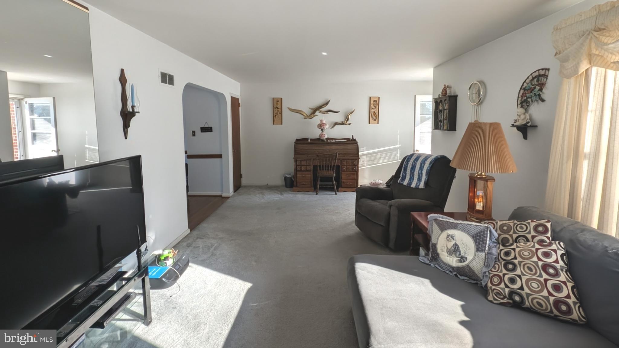 85 Savo Avenue Lancaster, PA 17601 - Photo 7 of 19 a living room with furniture and a flat screen tv