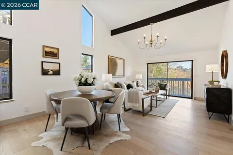 a view of a livingroom with furniture and window