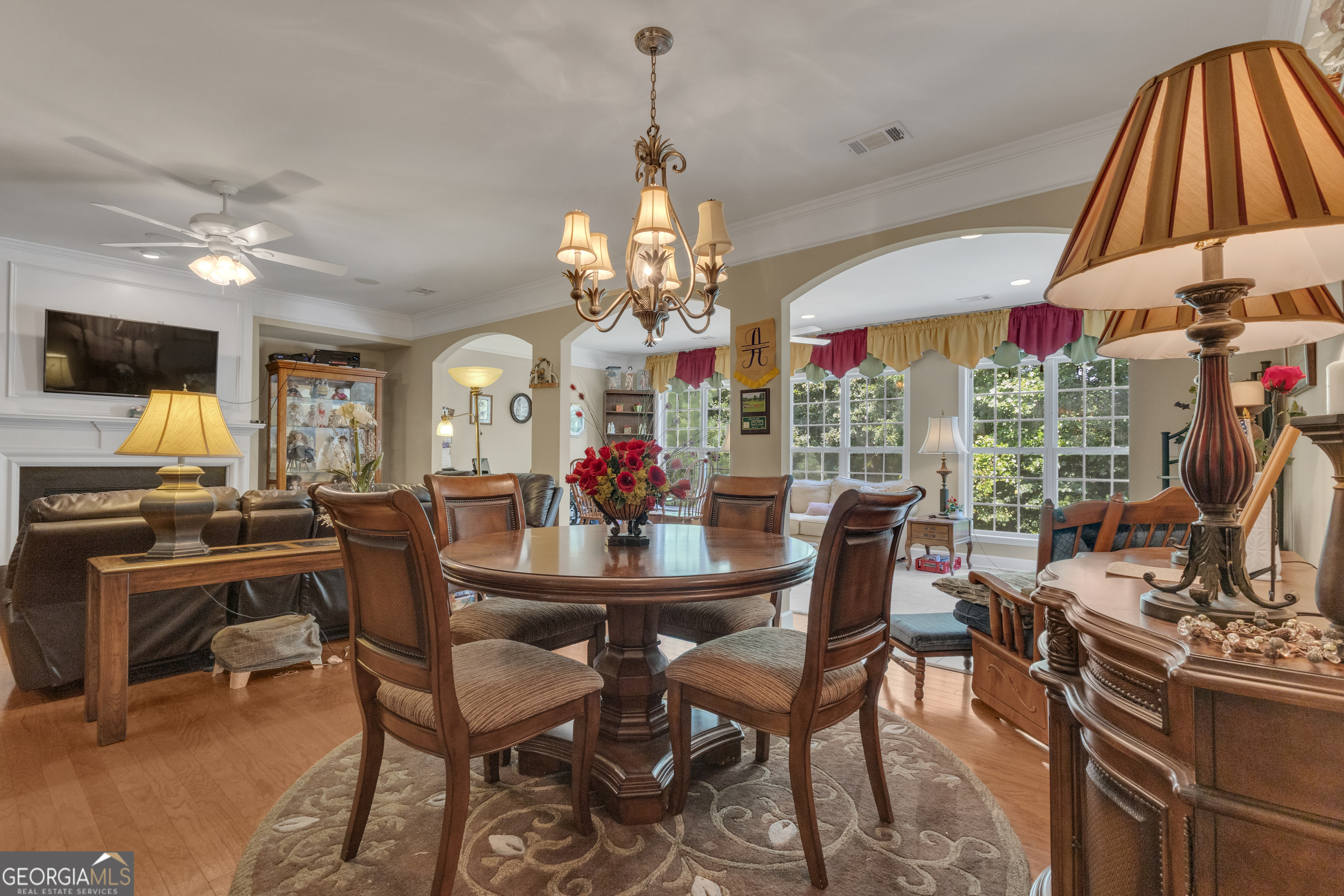 321 Anna Ruby Court Griffin, GA 30223 - Photo 20 of 81 a view of a dining room with furniture and a chandelier