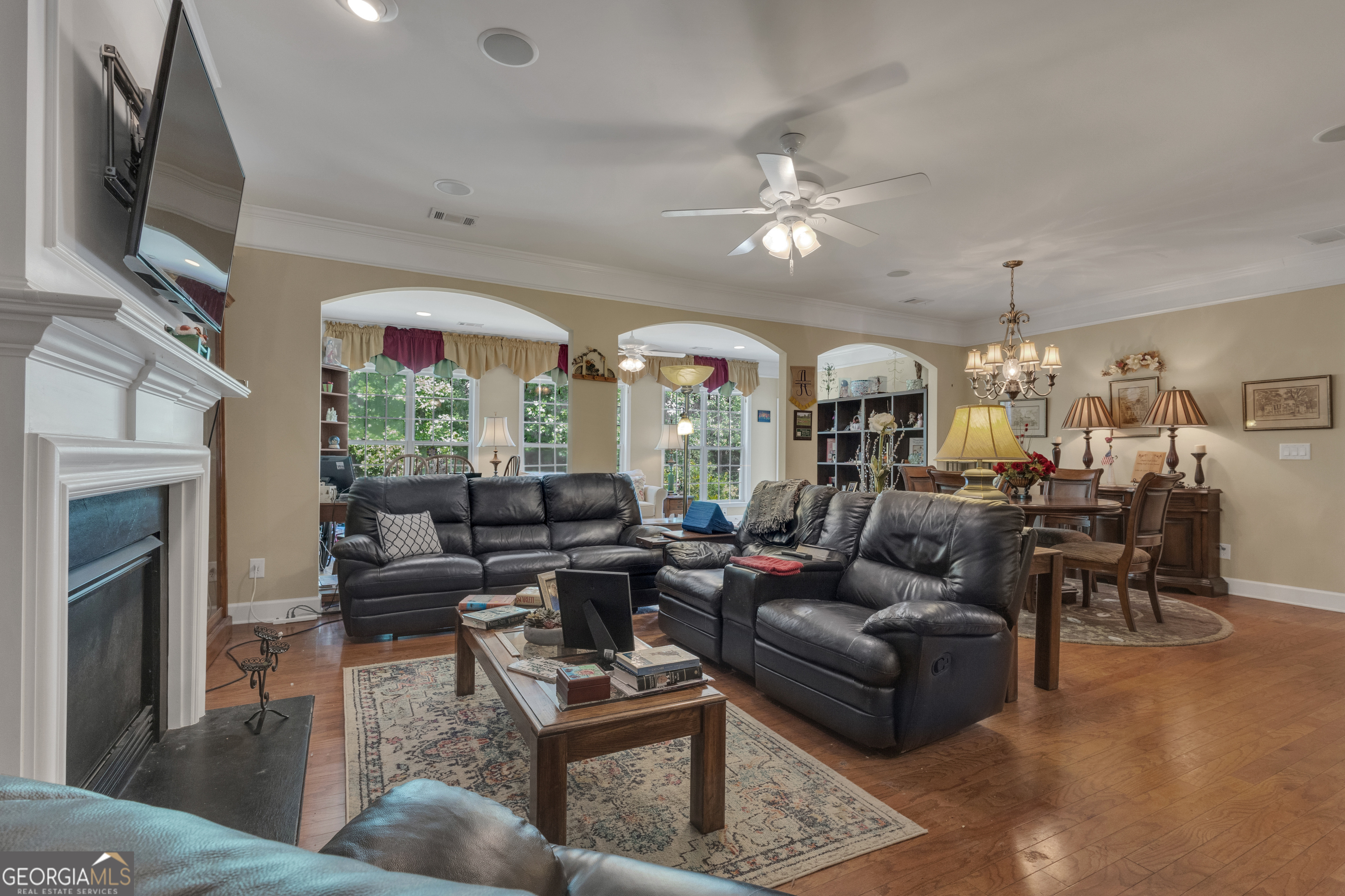 321 Anna Ruby Court Griffin, GA 30223 - Photo 23 of 81 a living room with fireplace furniture and a flat screen tv