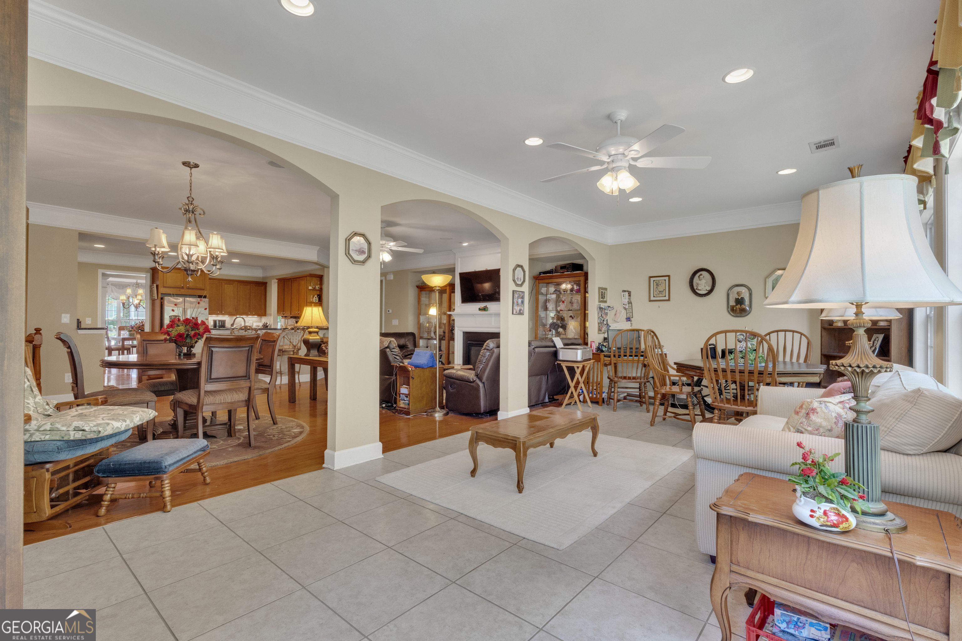 321 Anna Ruby Court Griffin, GA 30223 - Photo 27 of 81 a living room with lots of furniture and view of kitchen