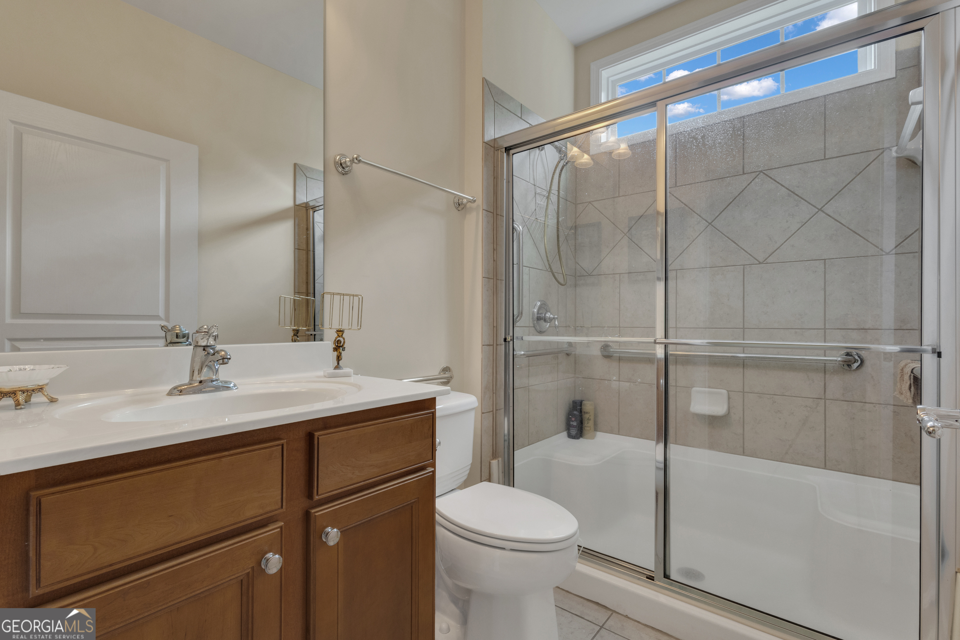 321 Anna Ruby Court Griffin, GA 30223 - Photo 42 of 81 a bathroom with a sink toilet and shower
