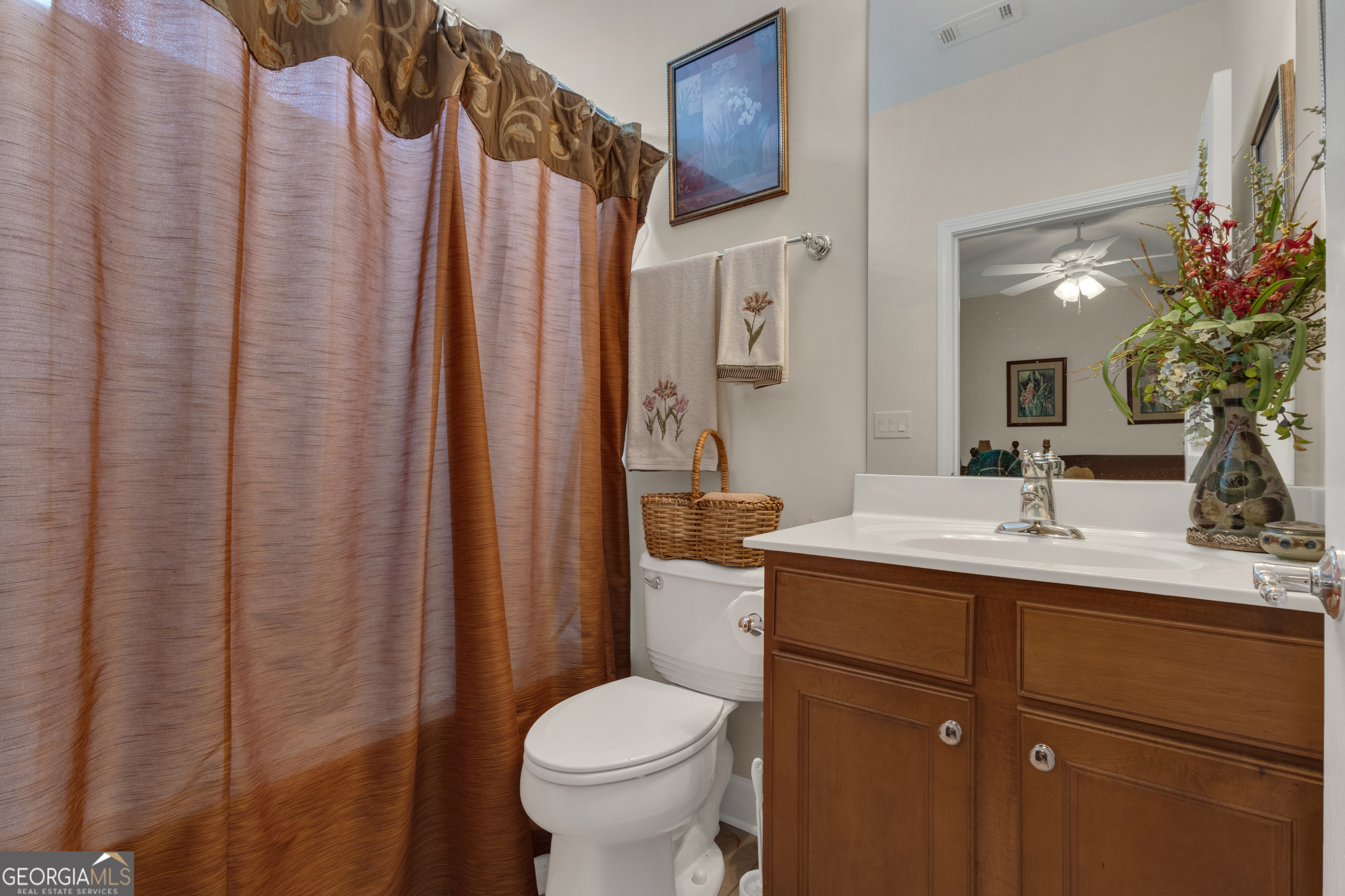 321 Anna Ruby Court Griffin, GA 30223 - Photo 45 of 81 a bathroom with a sink a toilet and shower