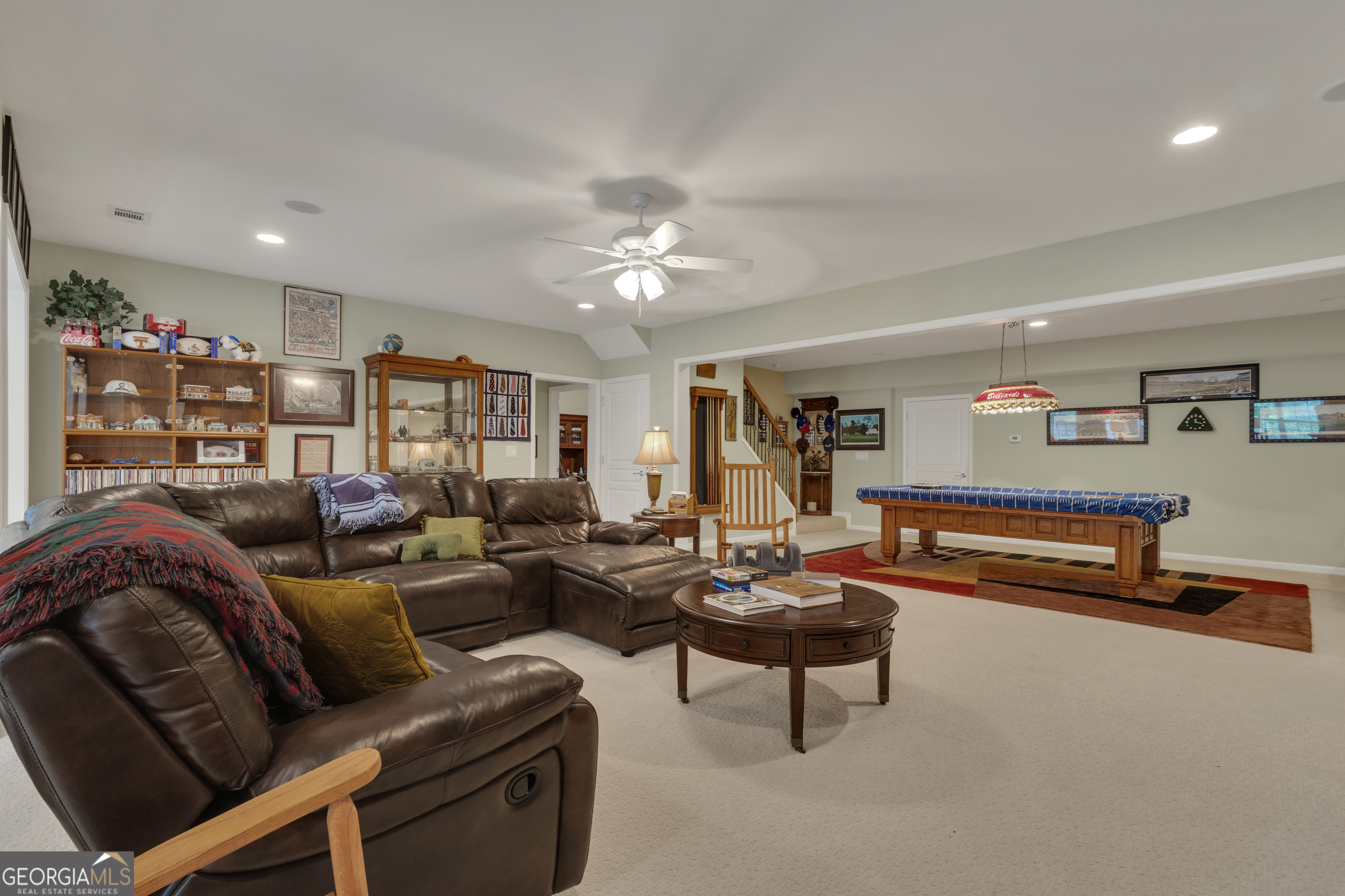 321 Anna Ruby Court Griffin, GA 30223 - Photo 54 of 81 a living room with furniture and a ceiling fan