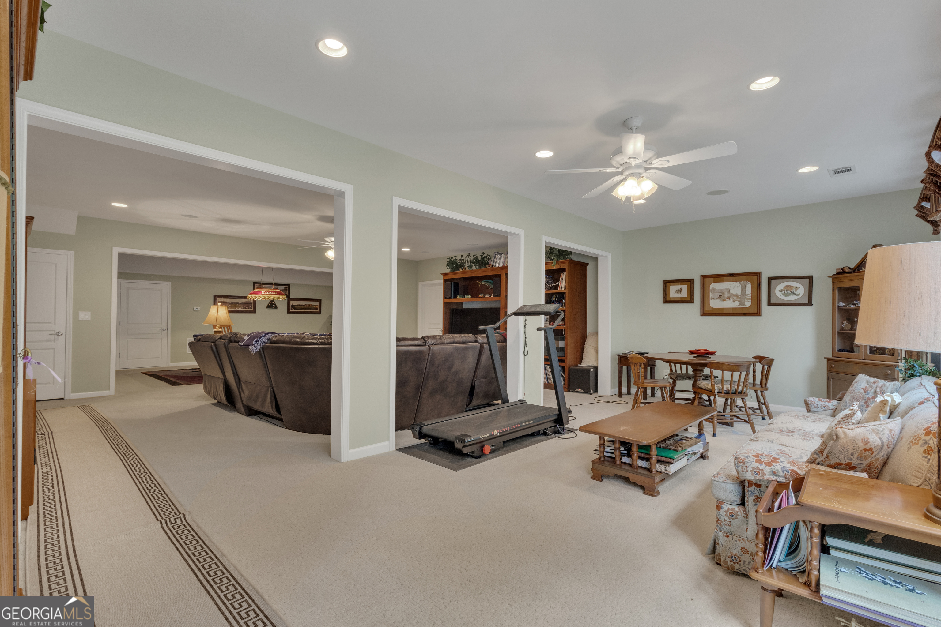 321 Anna Ruby Court Griffin, GA 30223 - Photo 60 of 81 a view of a livingroom with furniture and a flat screen tv