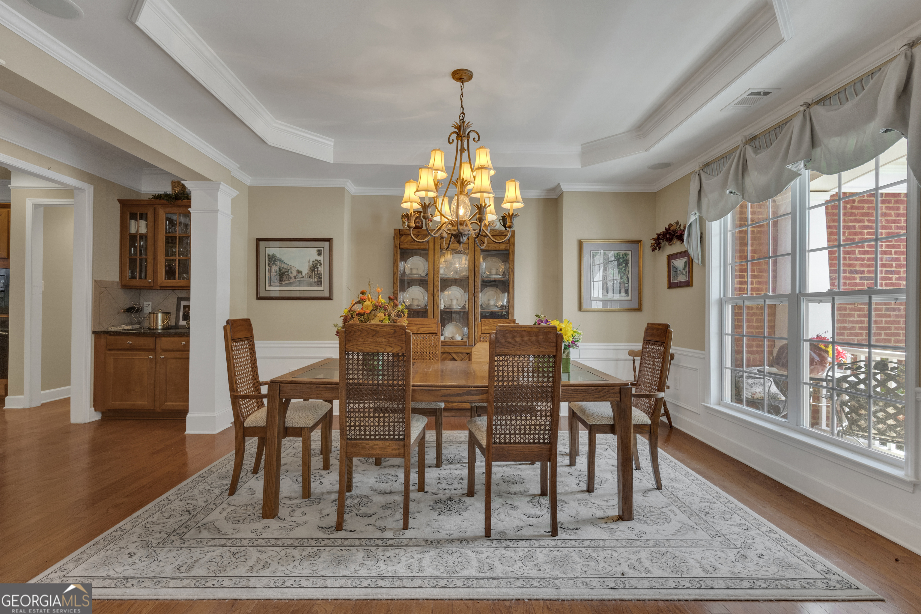 321 Anna Ruby Court Griffin, GA 30223 - Photo 6 of 81 a view of a dining room with furniture and wooden floor
