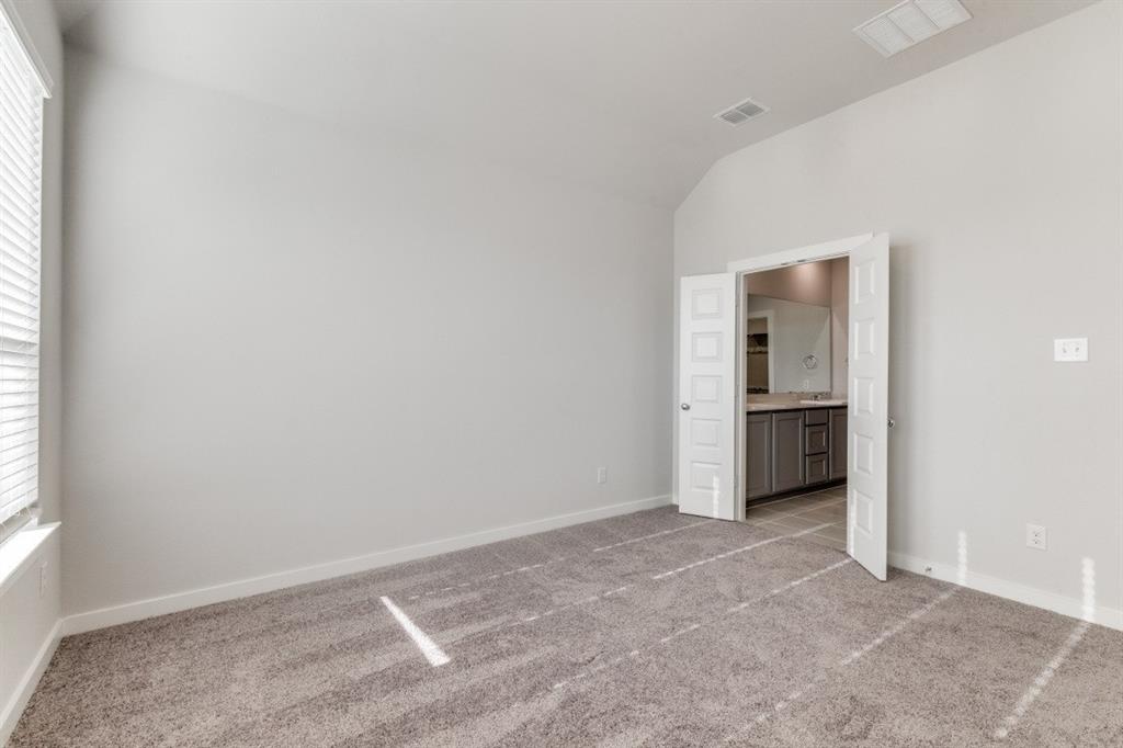 107 Huckleberry Road Forney, TX 75126 - Photo 11 of 30 a view of an empty room with a window