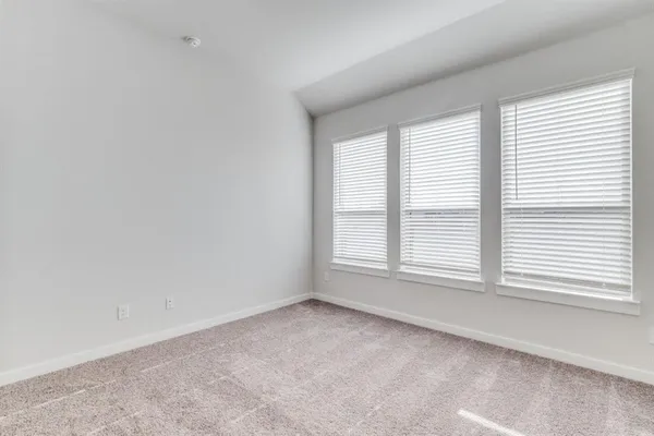 an empty room with an entryway