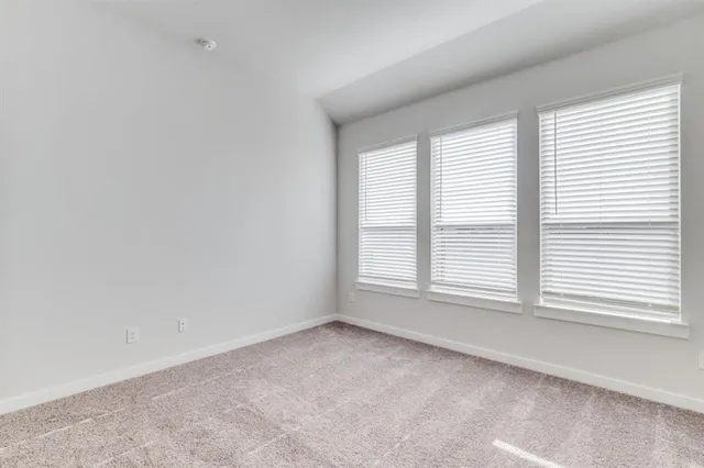 an empty room with an entryway