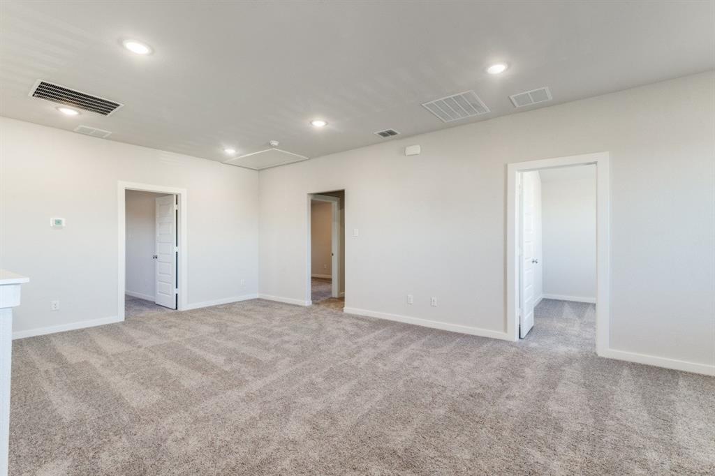 107 Huckleberry Road Forney, TX 75126 - Photo 15 of 30 an empty room with an entryway