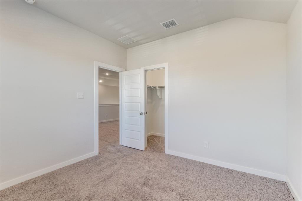107 Huckleberry Road Forney, TX 75126 - Photo 18 of 30 an empty room with closet