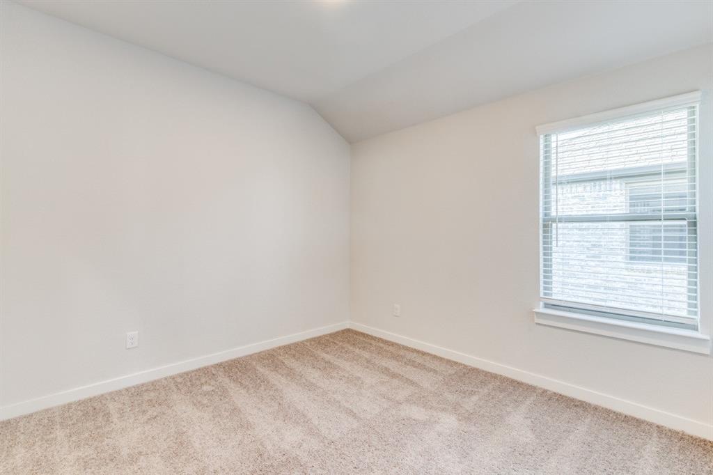 107 Huckleberry Road Forney, TX 75126 - Photo 19 of 30 an empty room with a window