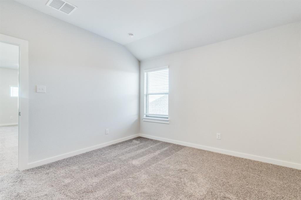 107 Huckleberry Road Forney, TX 75126 - Photo 22 of 30 an empty room with a window