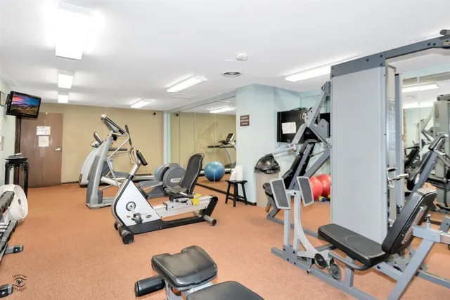 a view of a room with gym equipment
