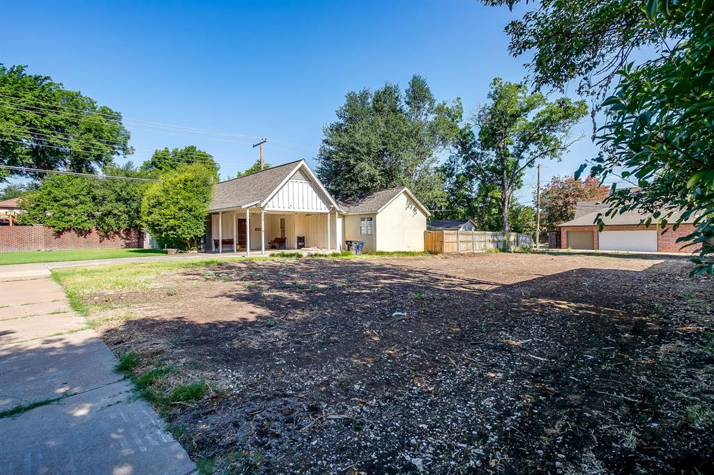 4120 Mattison Avenue Fort Worth, TX 76107 - Photo 14 of 20 a view of house with backyard and tree