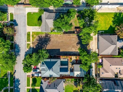 an aerial view of a house with swimming pool