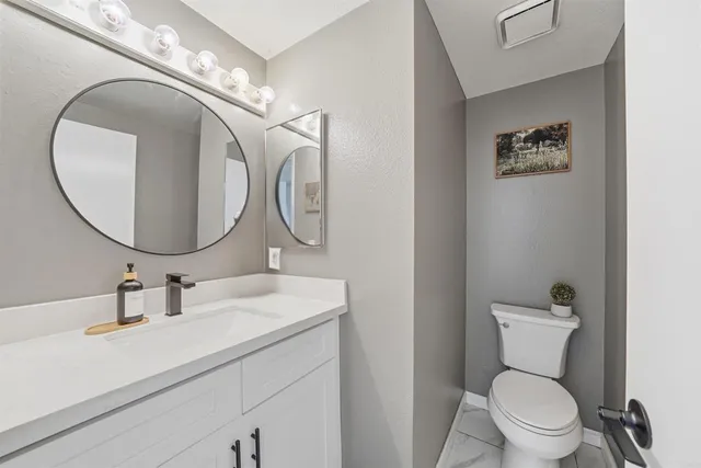 a view of livingroom with furniture and a flat screen tv