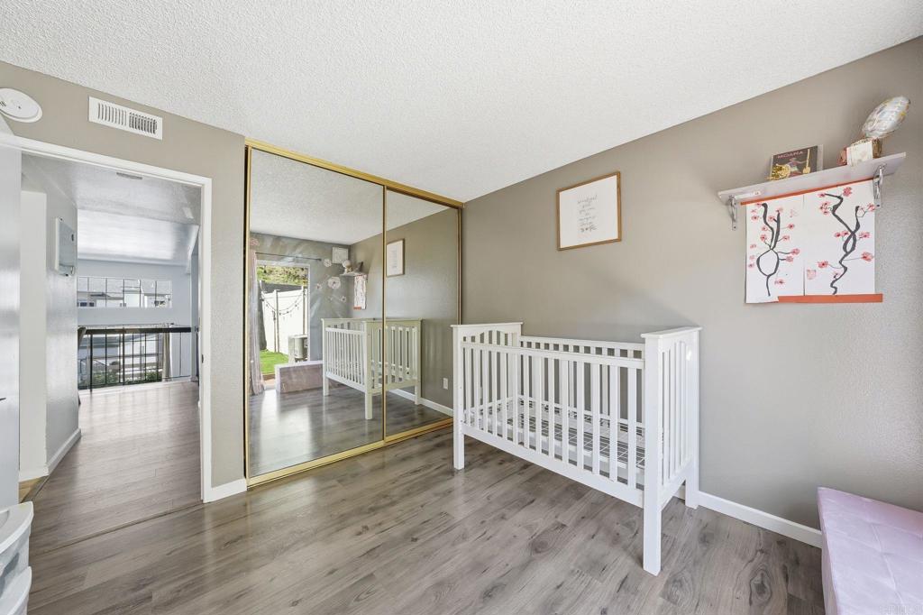8765 Spring Canyon Drive Spring Valley, CA 91977 - Photo 18 of 37 a view of entryway with wooden floor