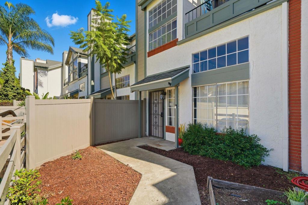 8765 Spring Canyon Drive Spring Valley, CA 91977 - Photo 2 of 37 a view of a house with a yard