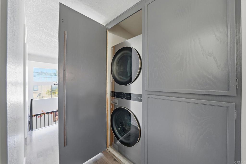 8765 Spring Canyon Drive Spring Valley, CA 91977 - Photo 35 of 37 a utility room with dryer and washer