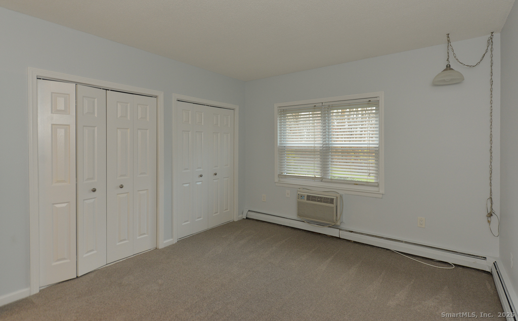 93 Balance Rock Road, Unit 1 Seymour, CT 06483 - Photo 11 of 15 a view of an empty room with a window