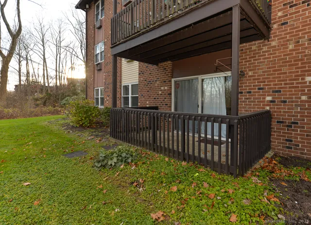 a view of a backyard with pathway