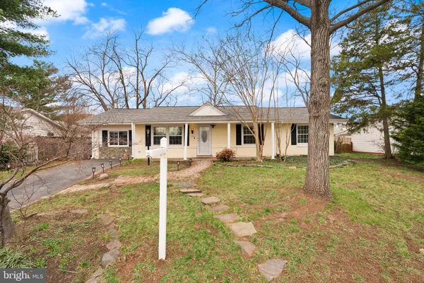 a view of a yard in front of a house