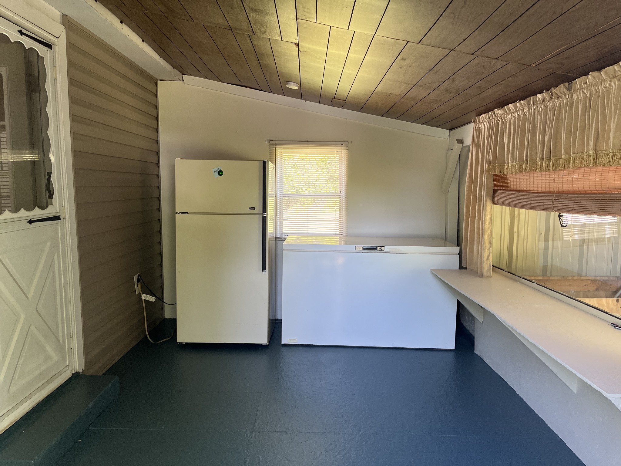1716 New Hope Road Joelton, TN 37080 - Photo 15 of 23 a view of room with window and refrigerator