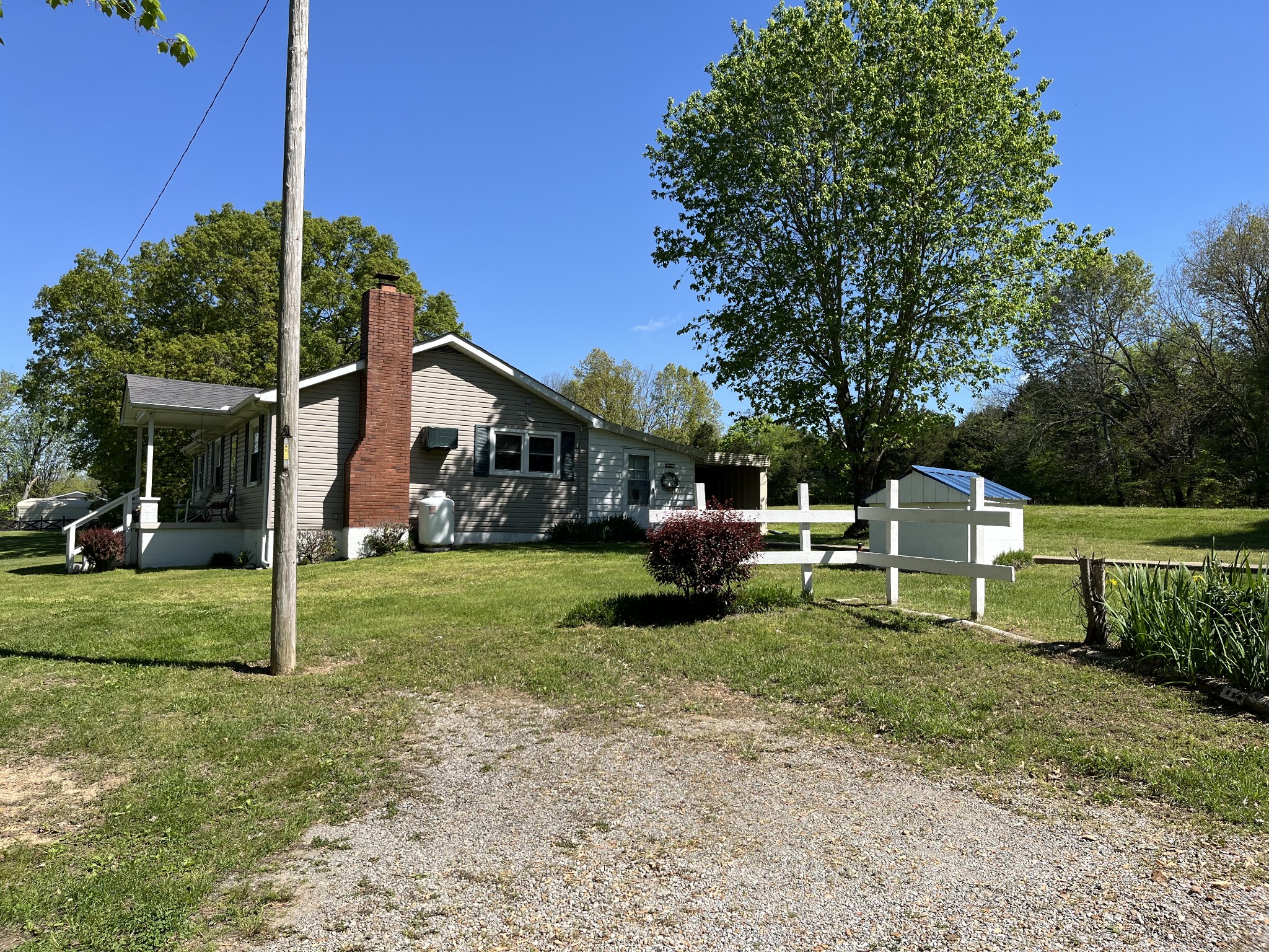 1716 New Hope Road Joelton, TN 37080 - Photo 18 of 23 a view of a house with a yard porch and sitting area