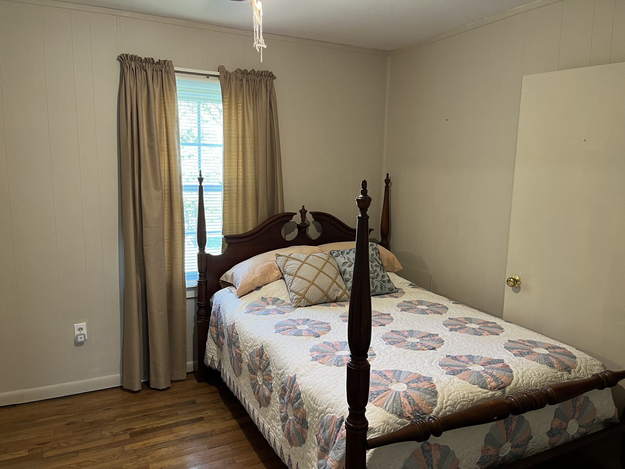 1716 New Hope Road Joelton, TN 37080 - Photo 6 of 23 a bedroom with a bed and wooden floor