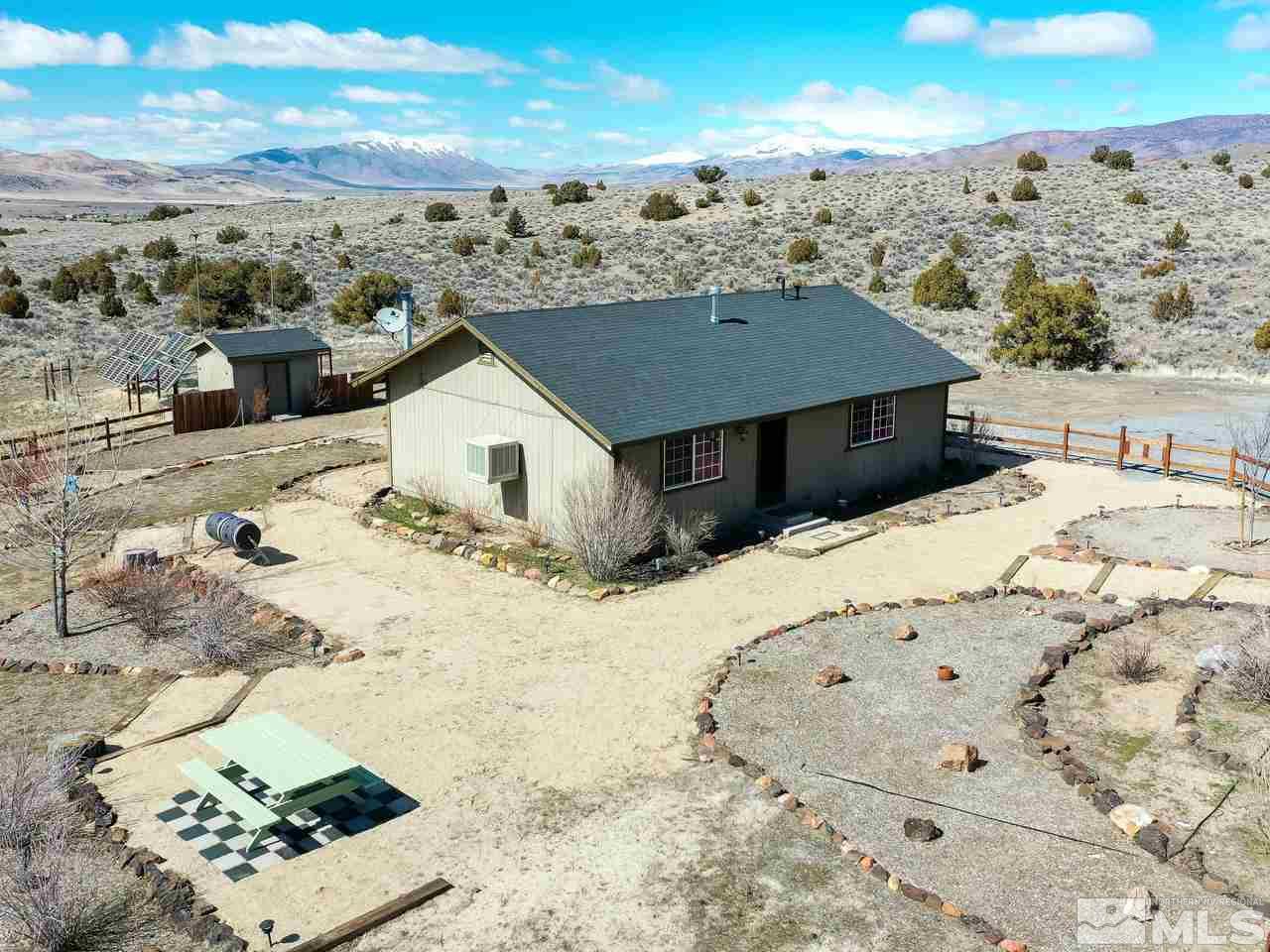 805 Hidden Canyon Road Reno, NV 89510 - Photo 1 of 24 a view of a backyard of the house