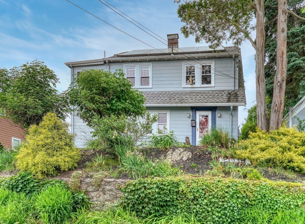 14 Paul Road Medford, MA 02155 - Photo 1 of 42 a front view of a house with garden