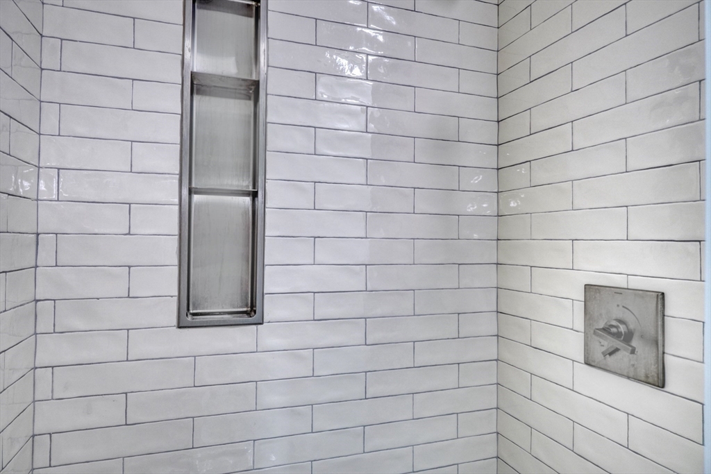 14 Paul Road Medford, MA 02155 - Photo 12 of 42 a bathroom with a shower