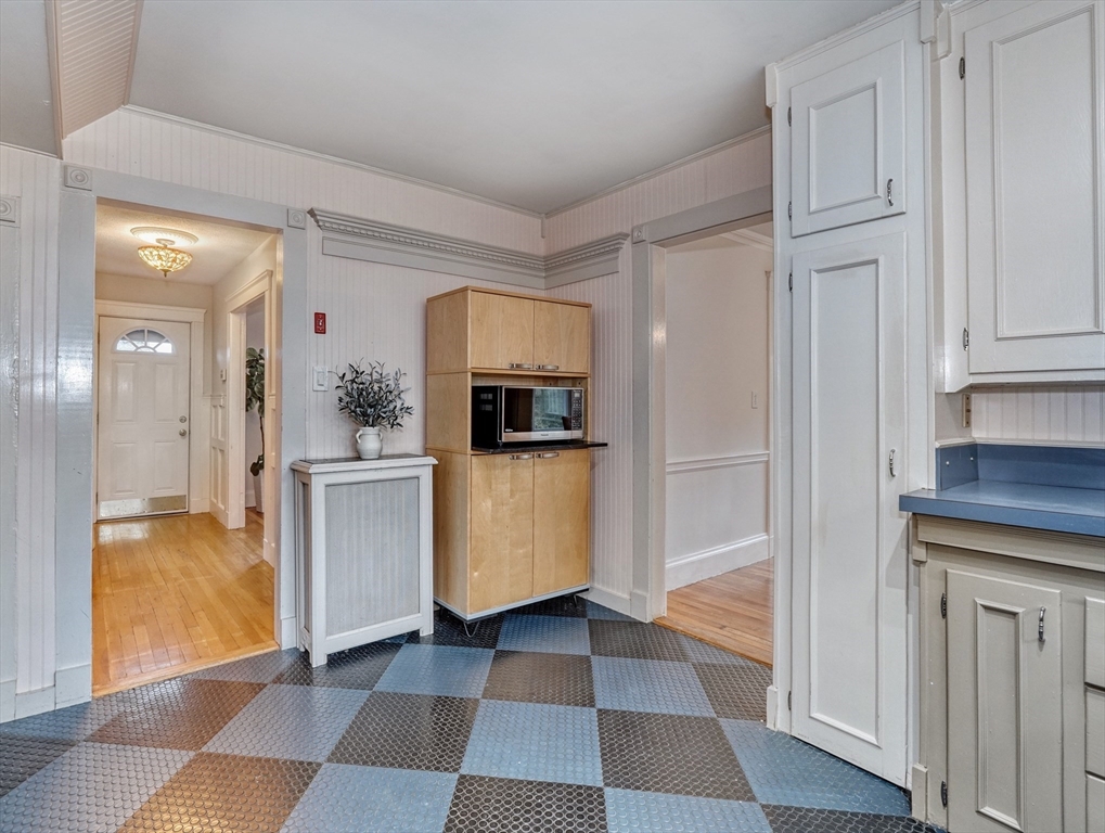 14 Paul Road Medford, MA 02155 - Photo 15 of 42 a view of a walk in closet with living room