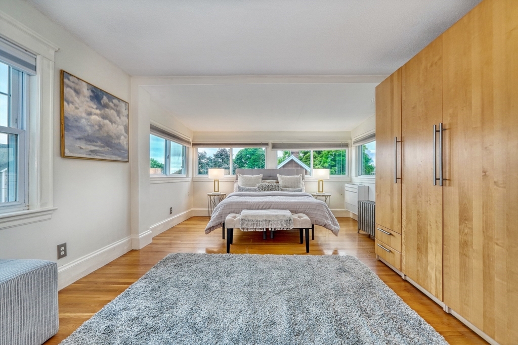 14 Paul Road Medford, MA 02155 - Photo 17 of 42 a living room with furniture and a rug