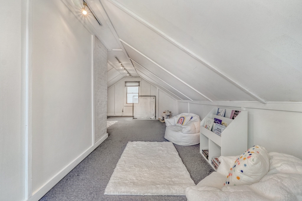 14 Paul Road Medford, MA 02155 - Photo 24 of 42 a bedroom with a bed and white walls