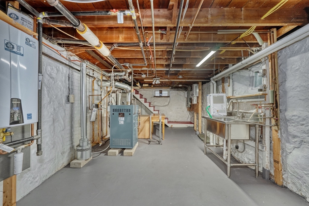 14 Paul Road Medford, MA 02155 - Photo 26 of 42 a view of an empty room with wooden shelves