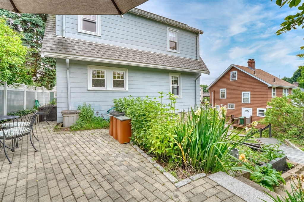 14 Paul Road Medford, MA 02155 - Photo 27 of 42 a front view of house with yard and seating space